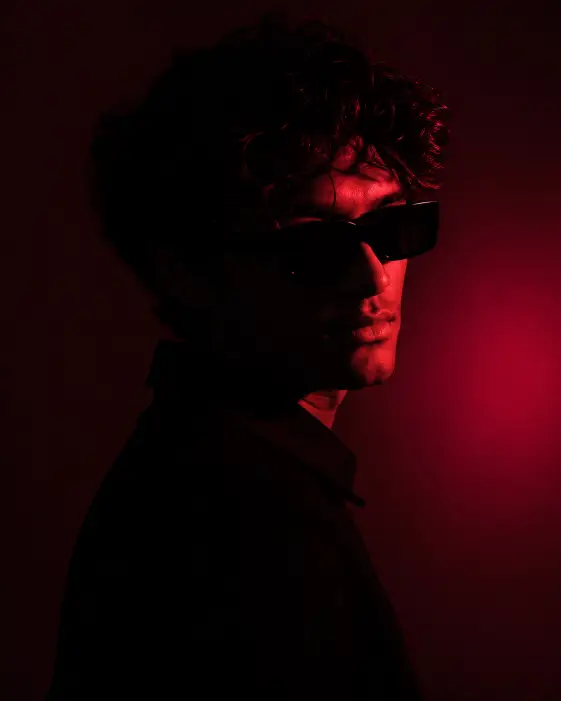 Red Gel Light Profile Portrait Prompt for Moody Photos